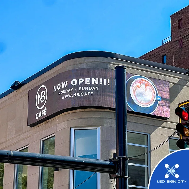 NB Cafe storefront with a full-color LED display above the entrance